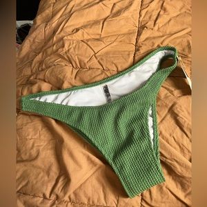 Victoria’s Secret small green bikini cheeky bottoms. New with tags. Size medium